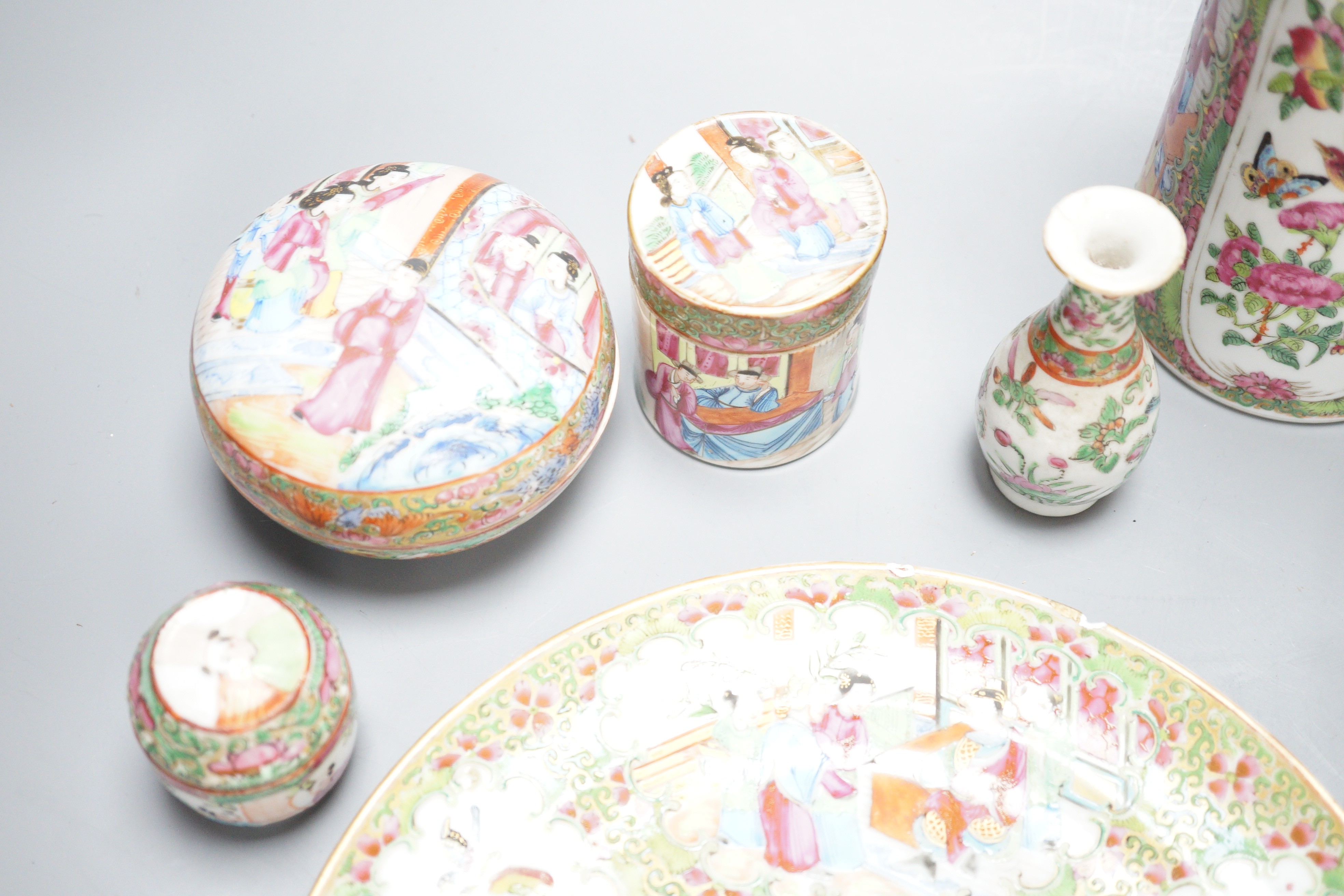 A group of 19th century Chinese canton wares including a sleeve vase, boxes, dishes etc.